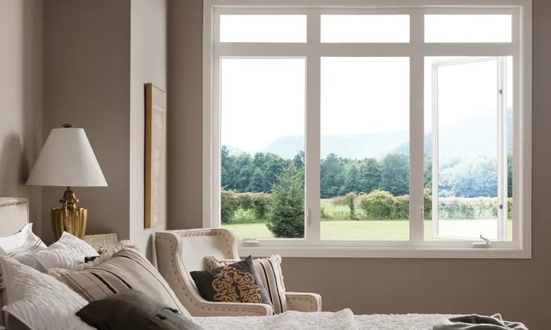 A Style Line slider and picture window filling a bedroom wall